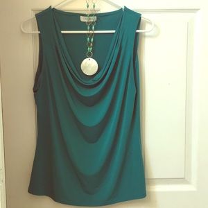 Scoop neck CK sleeveless.